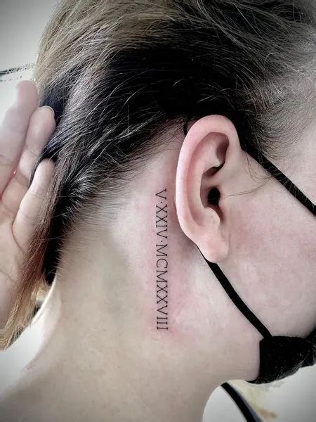 roman numerals rib tattoo|roman numeral tattoo behind ear.